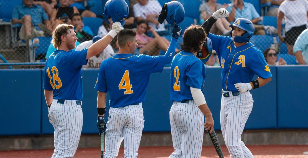 Tayten Tredaway, Austin Beck, Chase Pendley and Lane Hutchinson celebrate during the Angelo State baseball team's win over Lubbock Christian on Thursday at the NCAA Division II South Central Regional Tournament.