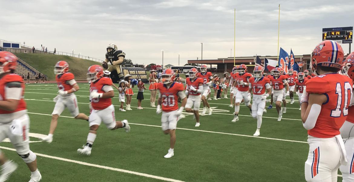 The Central Bobcats run onto the football field before their game against Amarillo High on Friday, Sept. 5, 2025, at San Angelo Stadium.