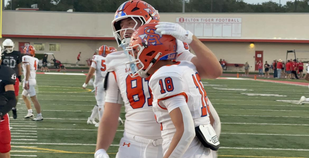 The Central Bobcats celebrate a touchdown against Belton.