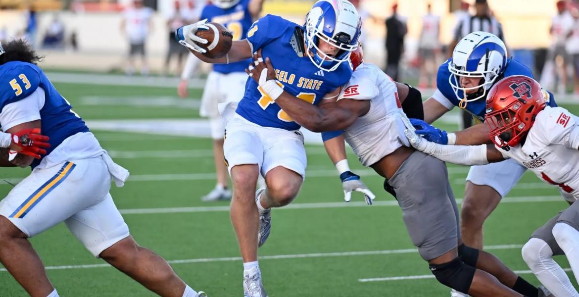 Angelo State running back Cameron Dischler battles for yardage against Sul Ross State in 2024. Angelo State running back Cameron Dischler battles for yardage against Sul Ross State in 2024.