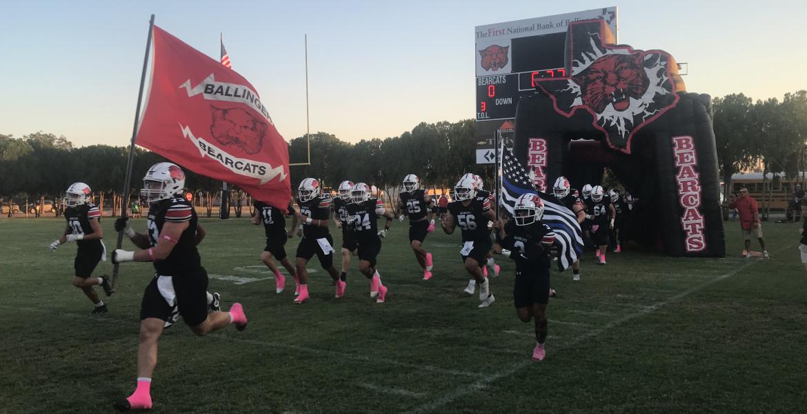 The Ballinger Bearcats run onto the field before their game against Bangs on Friday, Oct. 10, 2025, at Bearcat Stadium.