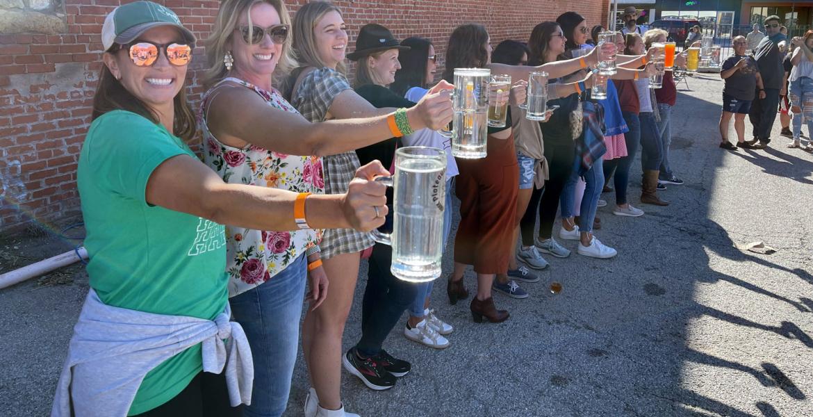 Female contestants see how long each can hold a beer stein at the 2023 Plateauberfest at Plateau Brewery Co. Female contestants see how long each can hold a beer stein at the 2023 Plateauberfest at Plateau Brewery Co.