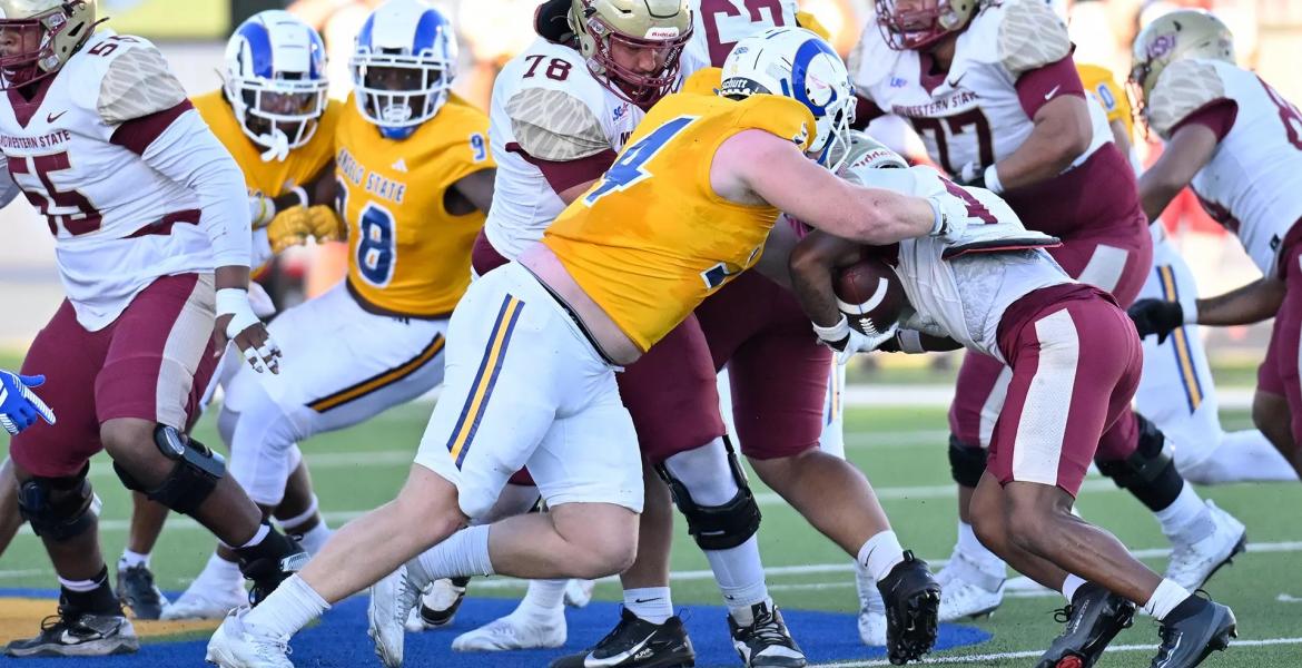 Owen Seaver makes a tackle for Angelo State during the Rams' 48-28 win over Midwestern State on Saturday, Oct. 18, 2025.