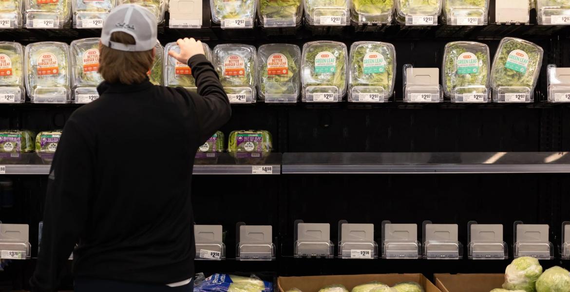 A customer stocks up on produce at an Austin H-E-B on Jan. 13, 2024.