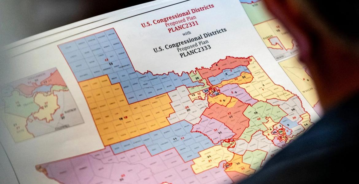 State Rep. Matt Morgan, R-Richmond, surveys a map of proposed new congressional districts in Texas, as Democratic lawmakers, who left the state to deny Republicans the opportunity to redraw the state's 38 congressional districts, began returning to the Texas Capitol in Austin on Aug. 20, 2025.