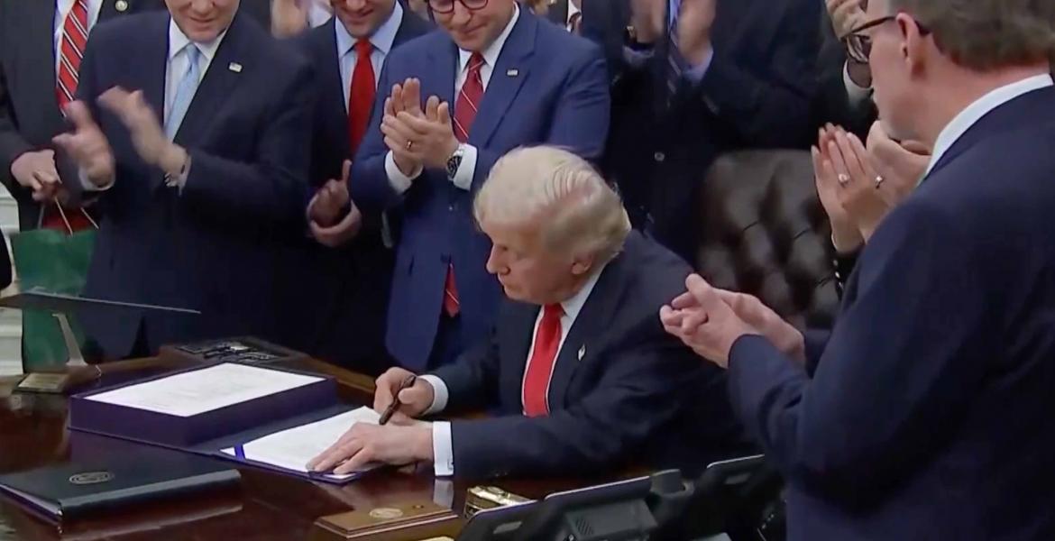 Trump Signing Something