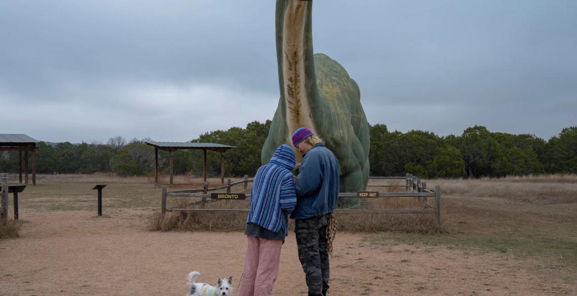 Nicholas Hanson and Haley Write of Austin with their dog Beans at Dinosaur Valley State Park on Nov. 7, 2025. A proposed transmission line could be visible from the park.