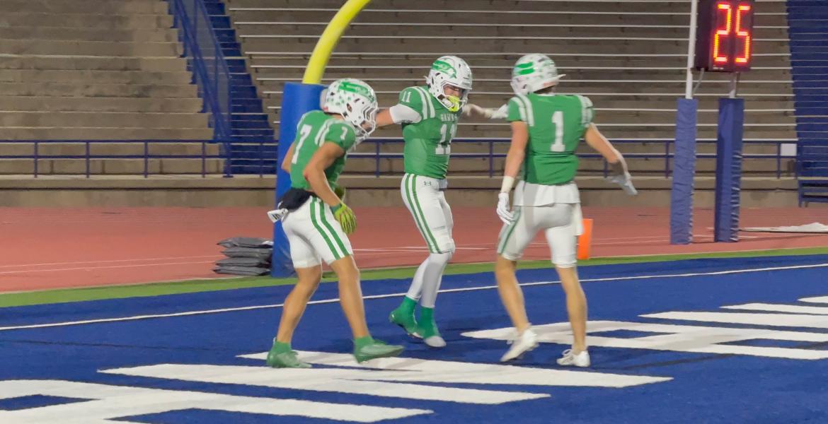 The Wall Hawks celebrate after a touchdown against Idalou in the regional final at San Angelo Stadium on Friday, Dec. 5, 2025.