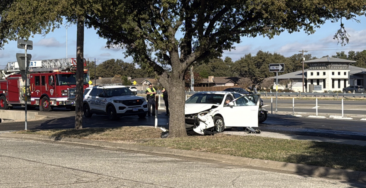 White Toyota Camry strikes a tree in crash