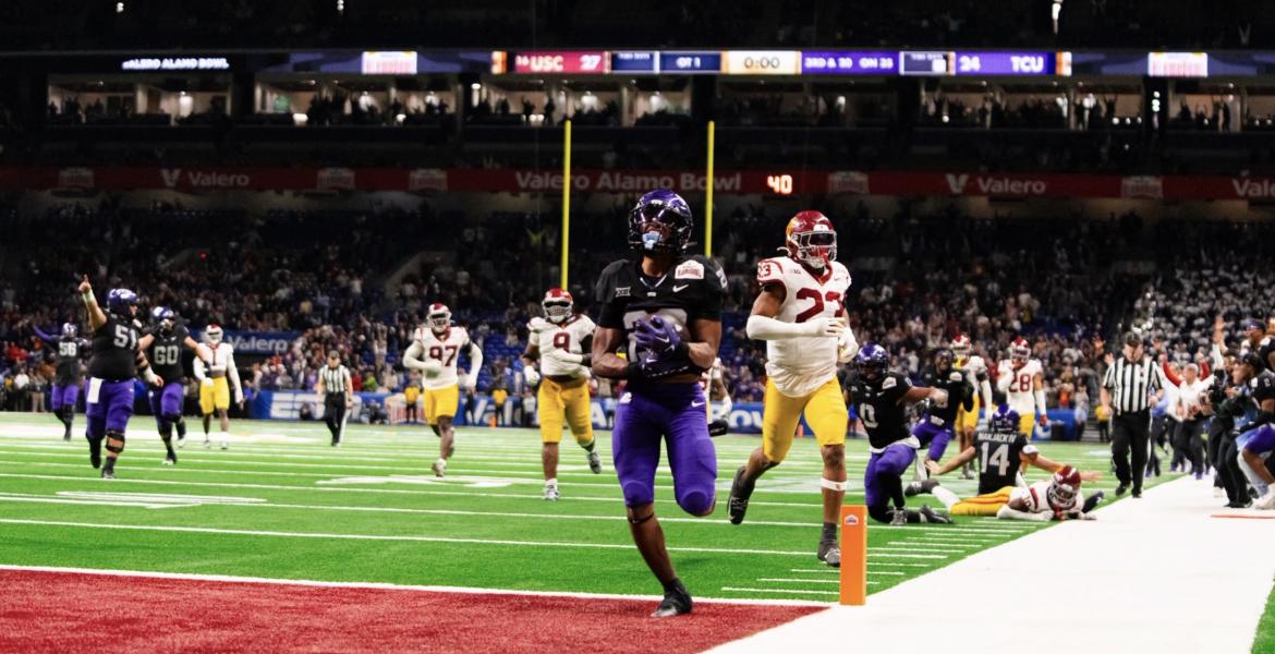 TCU's Jeremy Payne scores a touchdown in overtime to beat USC in the Alamo Bowl