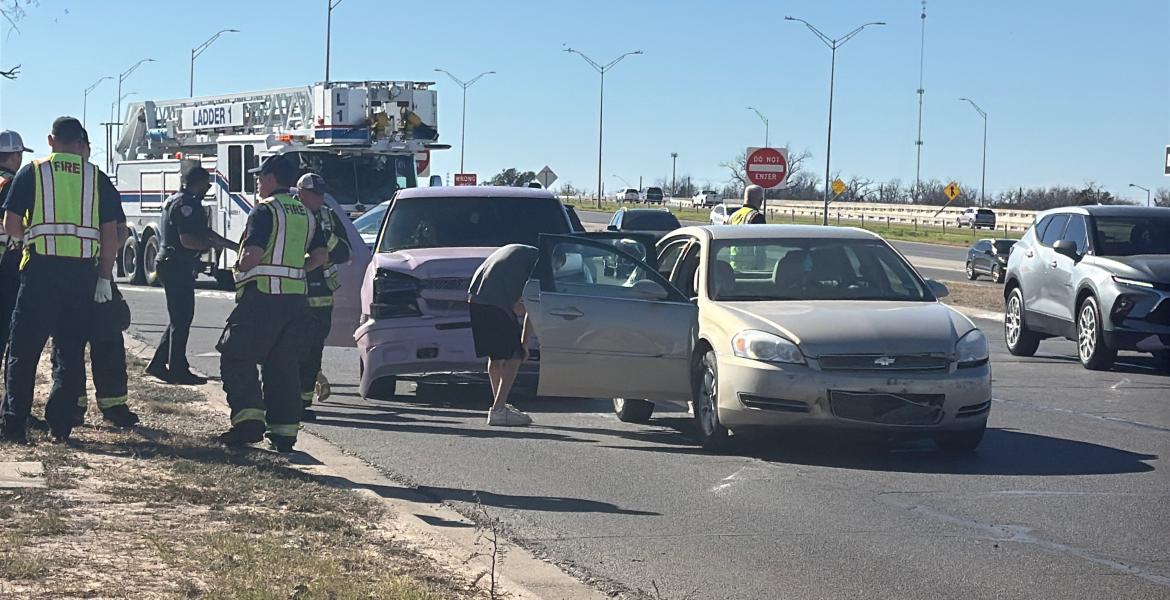 A crash Friday on a Houston Harte frontage road sent two people to the hospital.