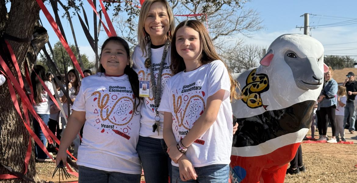 The students pictured designed the shirts being worn for the event.