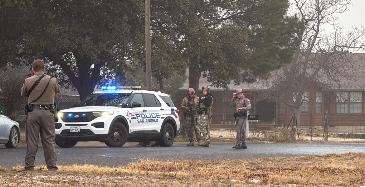 Law enforcement has surrounded a house in a San Angelo neighborhood after a car chase Friday morning.