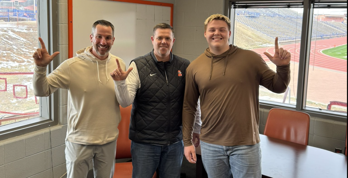 San Angelo Central junior offensive lineman Ethan Boyd is shown with Central head coach Mark Smith (left) and Oklahoma State offensive line coach Cody Crill after receiving an offer to play for Oklahoma State.