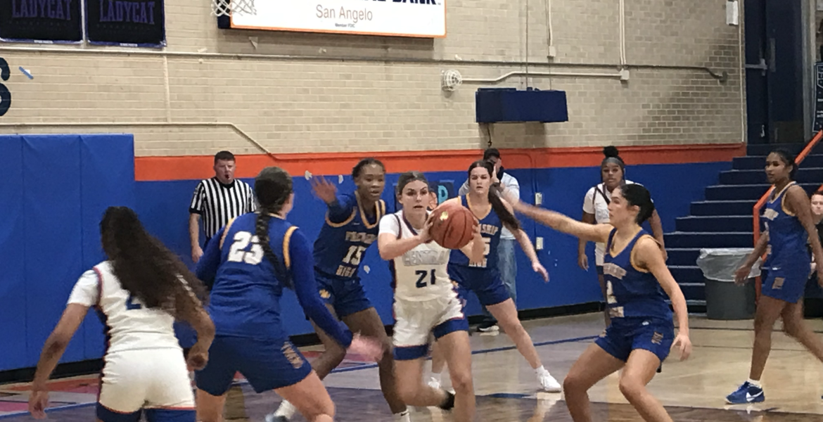 San Angelo Central's Karsyn Scott tries to pass out of Frenship's swarming defense Friday, Jan. 16, 2026.