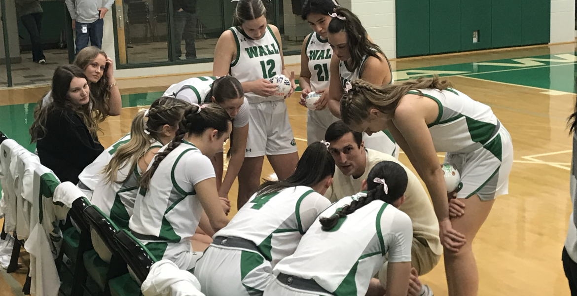 Wall girls basketball coach Silas Crisler talks to his team before their game against Jim ned on Tuesday, Jan. 20, 2026.