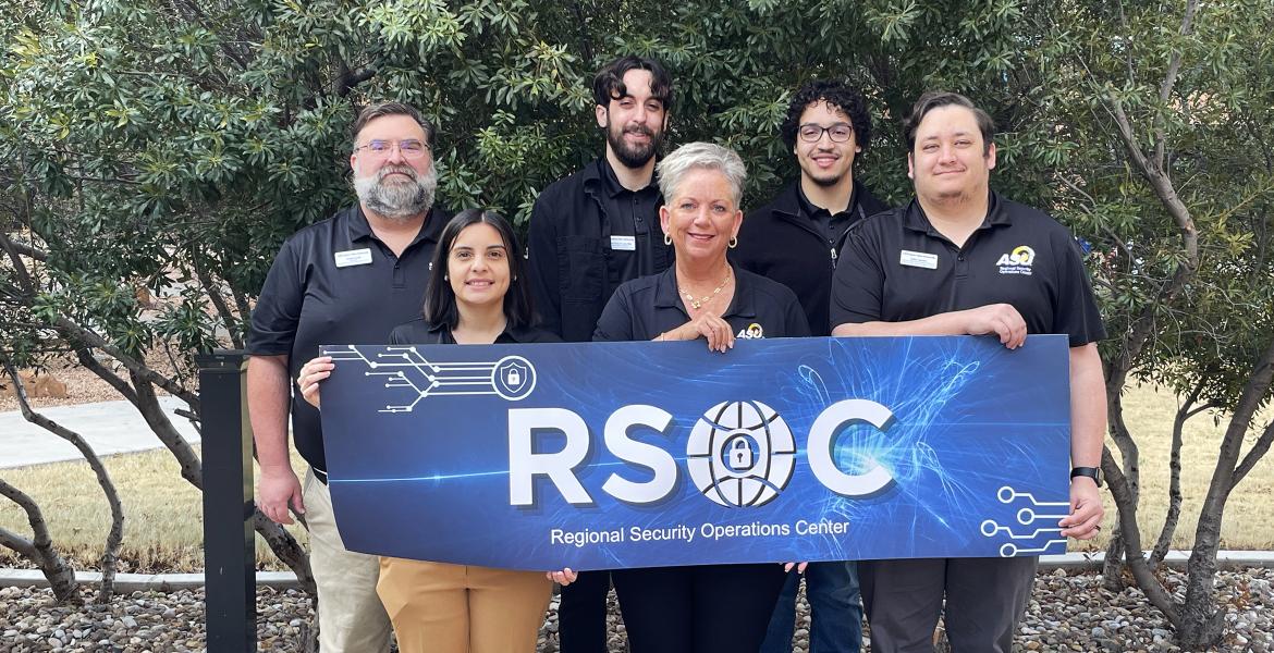 (Back L-R) Russell Ezzell, RSOC manager; Nic Diaz, cyber engineer; Gideon McMickle, cyber engineer - (Front L-R) Hailey Lowden, cyber engineer; Becky Bray, procurement specialist; Kolten Sinclair, cyber engineering team lead.