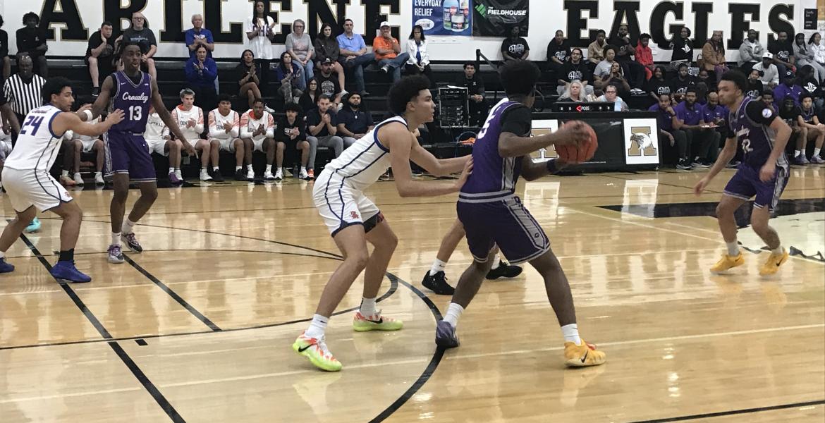 San Angelo Central's TK Taylor defends Crowley's Collin King Sumberlin in their second-round playoff game Friday, Feb. 27, 2026.