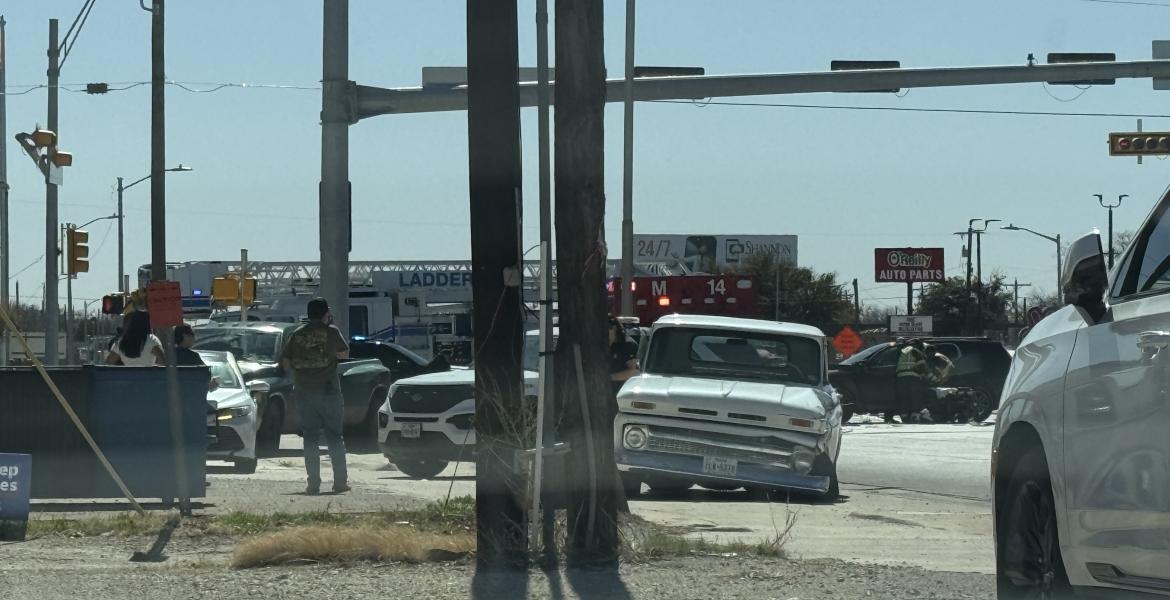 A two-vehicle crash has shut down the intersection of Bryant Boulevard and Avenue N, sending at least one person to the hospital.