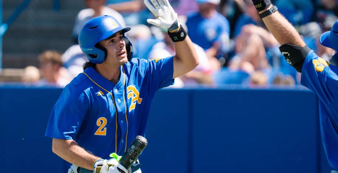 Angelo State's Chase Pendley celebrates with a teammate during the 2025 season.