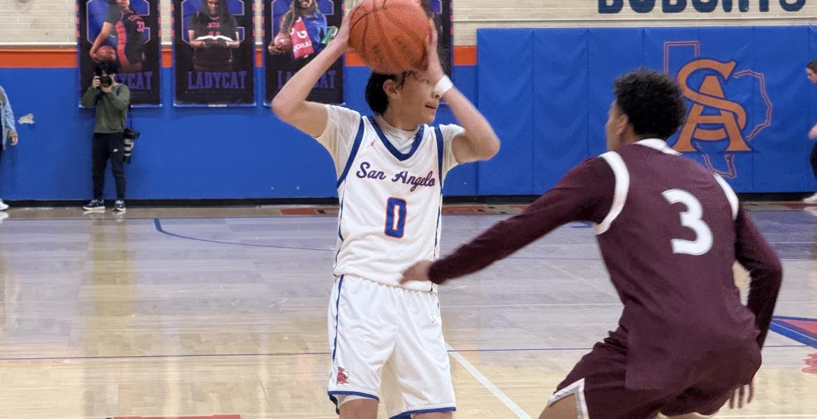 Central Bobcats' Ean McNeill in action against Midland Legacy
