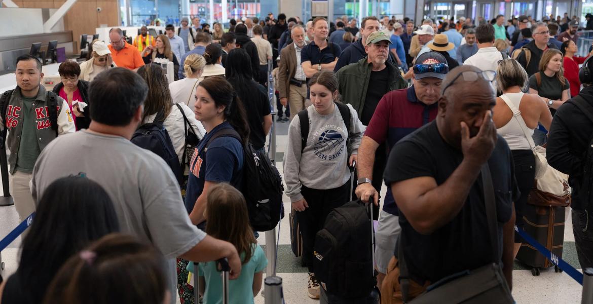 Travelers wait for hours in long TSA lines at the George Bush Intercontinental Airport in Houston on March 25, 2026. REUTERS/Antranik Tavitian