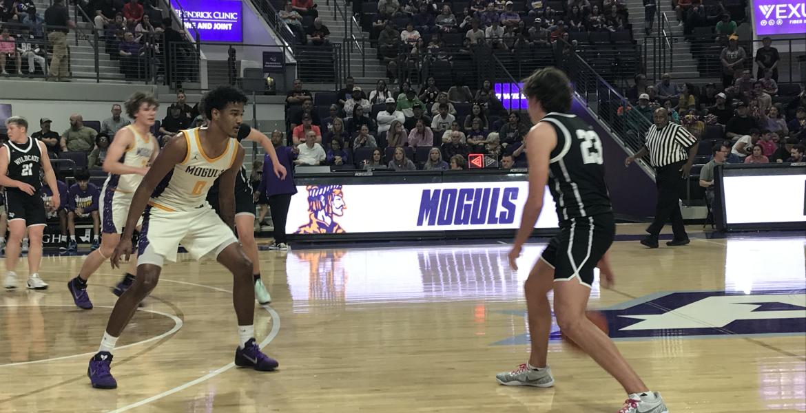 Water Valley's Branson Lacy dribbles against the defense of Munday's Jariyis Williams in their regional final game Friday, March 6, 2026.