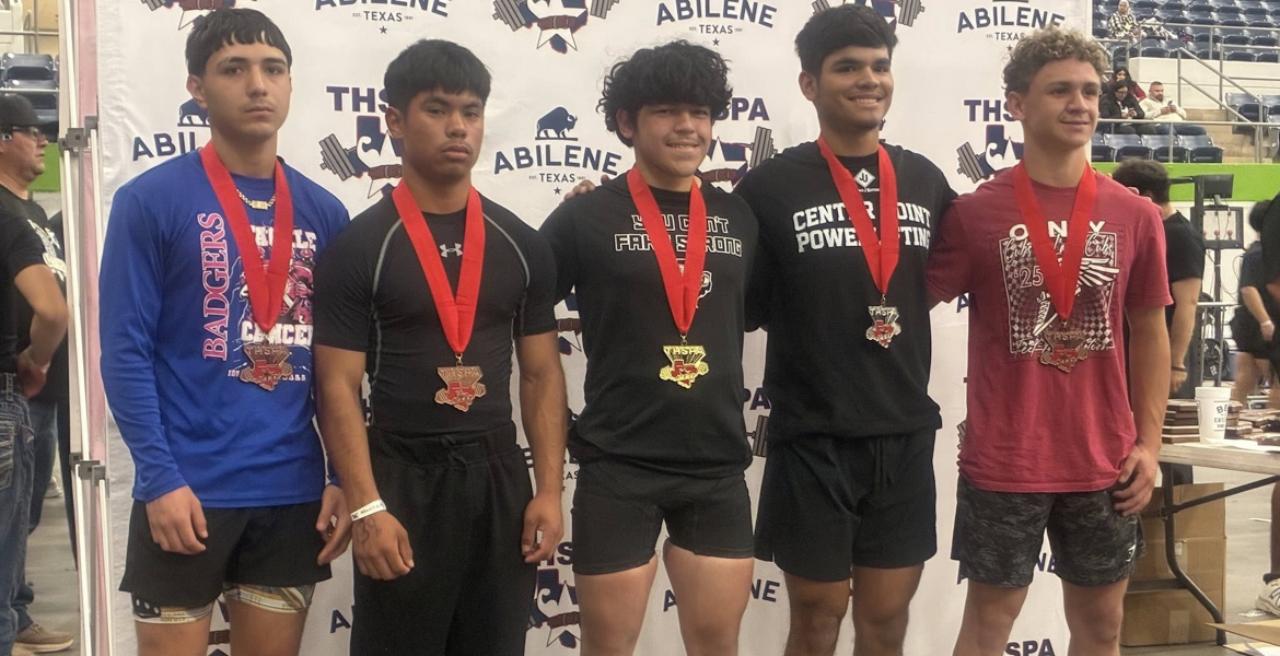 Ballinger’s Treyven Lopez (second from left) took third place in the 132-pound class Friday at the Division IV state powerlifting meet at the Taylor County Expo Center in Abilene.