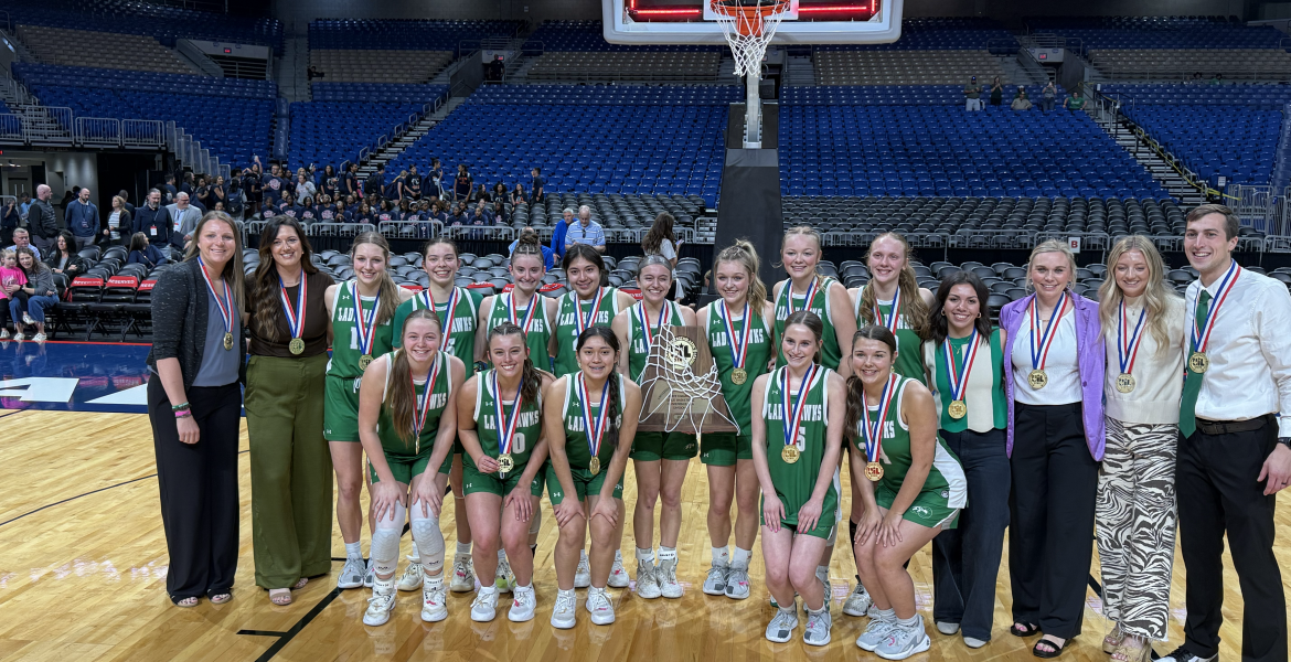 The Wall girls basketball team poses with its championship trophy after defeating Central Heights 49-34 in the Class 3A Division II state final Monday, March 6, 2026, at the Alamodome in San Antonio.