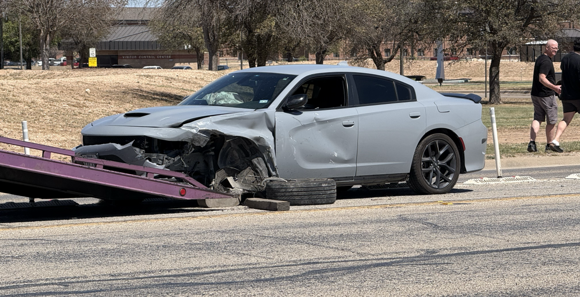 A two-vehicle collision Thursday afternoon in front of Goodfellow Air Force Base has reduced outgoing traffic to one lane.