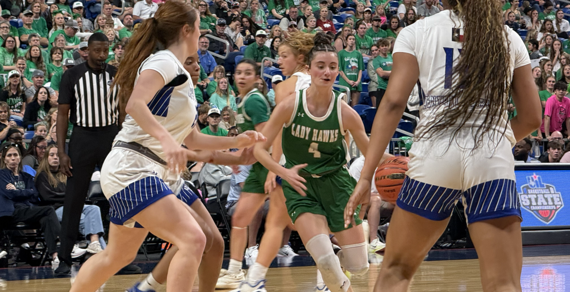 Wall's McKenzie Lopez drives against Central Heights' defense in the Class 3A Division II state final Friday, March 6, 2026.