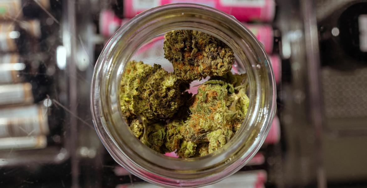 Happy Clouds smoke shop on Guadalupe Street in Austin displays hemp flower bud on March 30, 2026, the day before the state banned its sale.