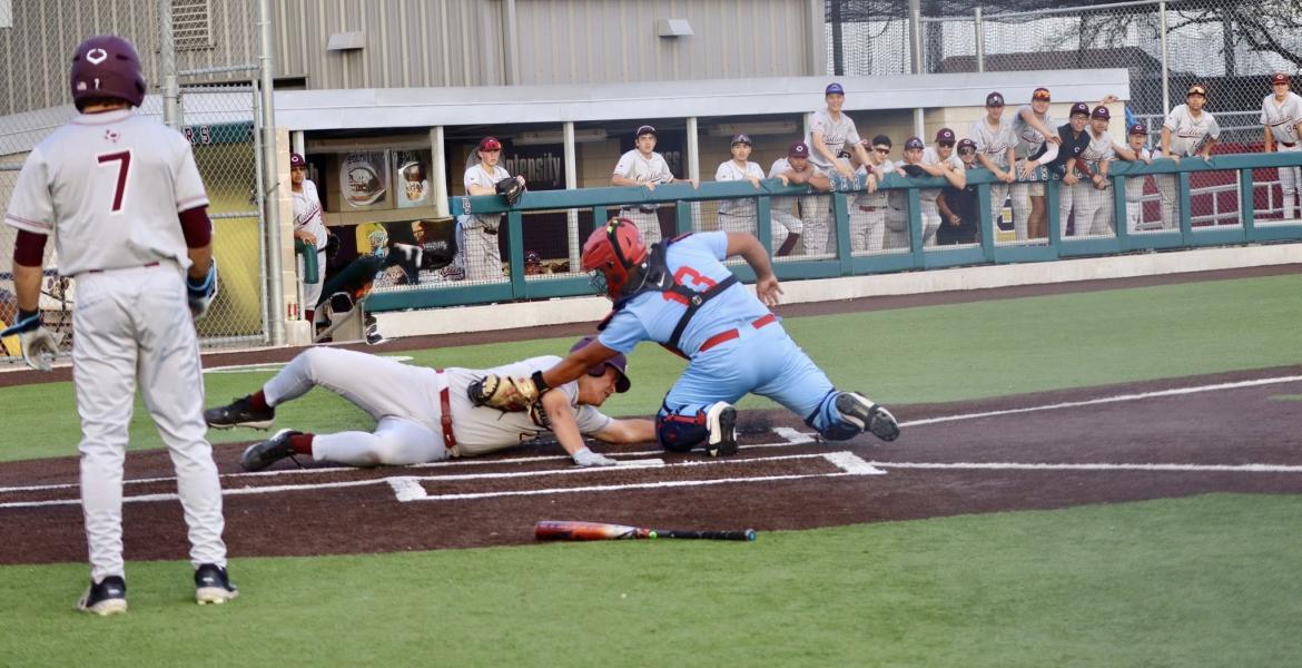 Calallen's baseball team tries to score a run during the 2026 season.