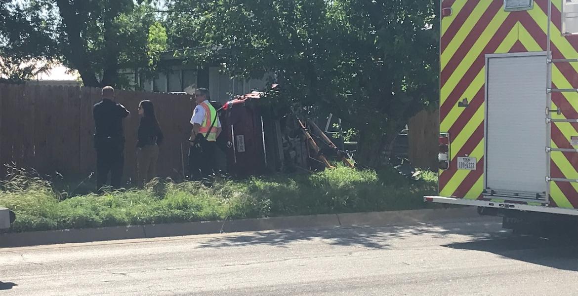 Rollover crash at Bell St and Belaire Ave on Friday, April 24, 2026
