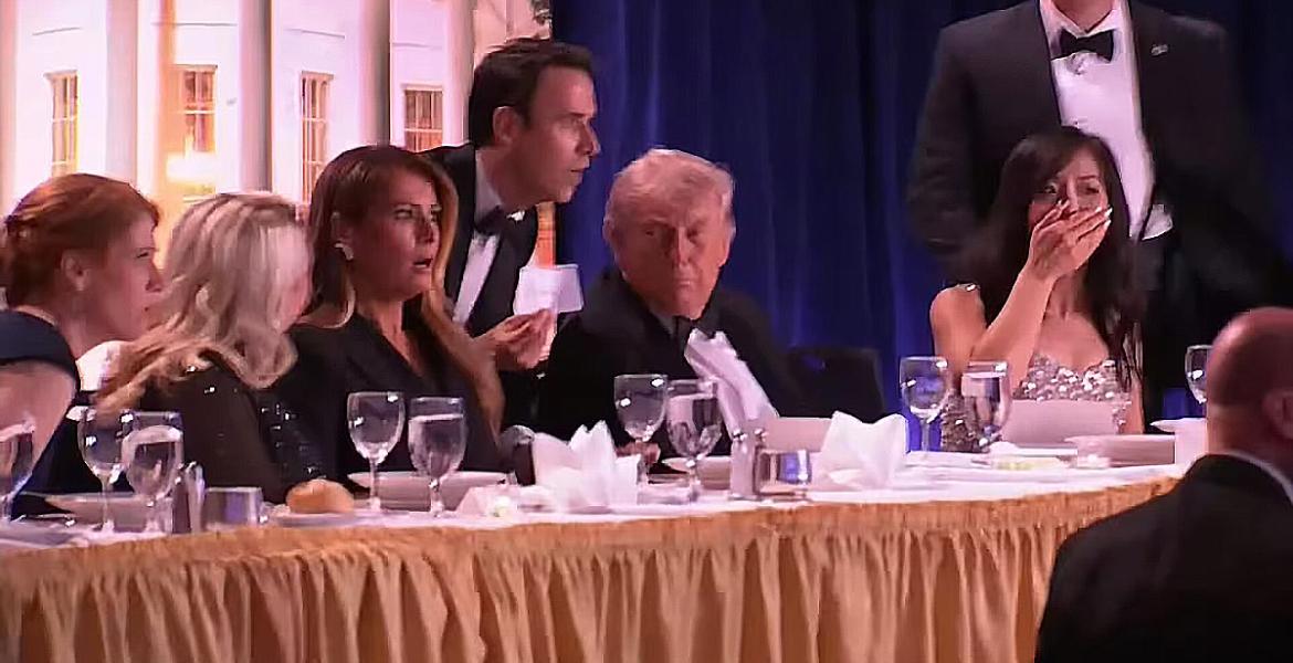 President Donald Trump at the White House Correspondents Dinner shortly before shots were fired.