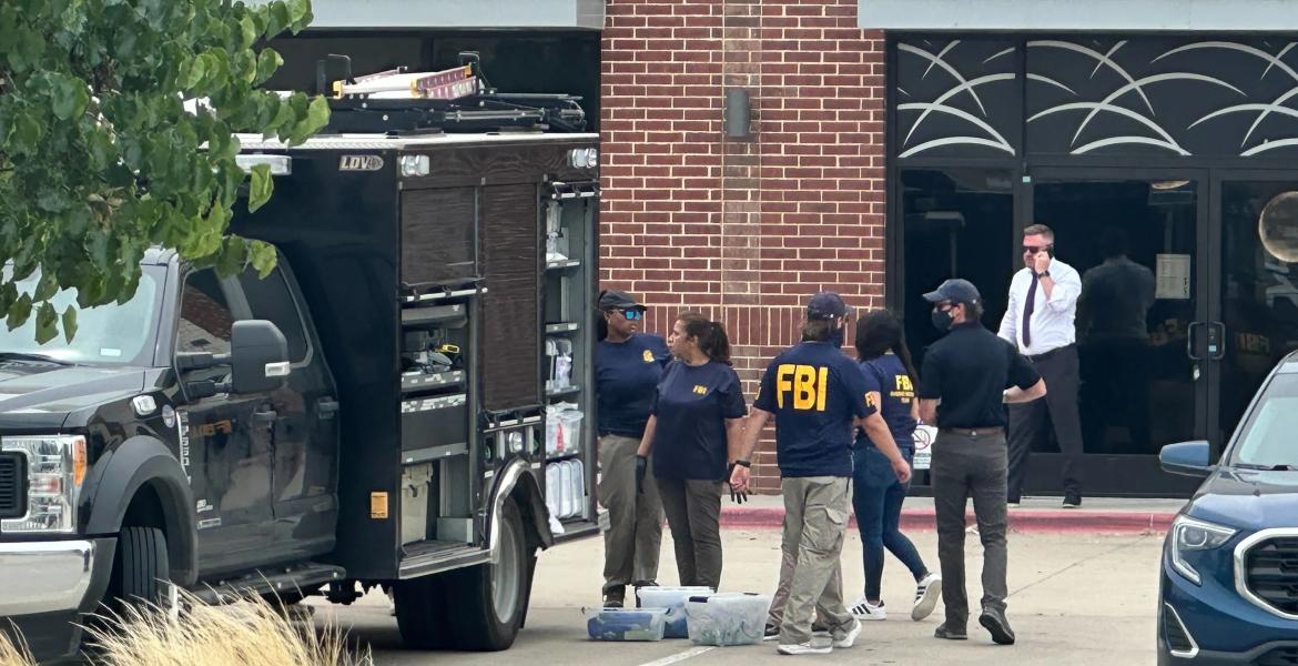 Law enforcement responds to the scene of a shooting on Tuesday, May 5, 2026, at K Towne Plaza in Carrollton.