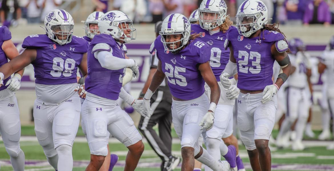 Abilene Christian's football team celebrates during the 2025 season.