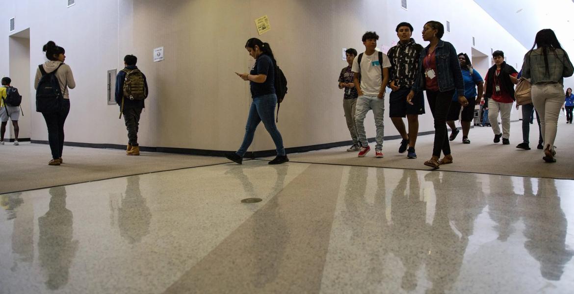 High school students walk to an after-school science tutorial that provides additional support for students taking the STAAR test at Elsik 9th Grade Center on April 19, 2018