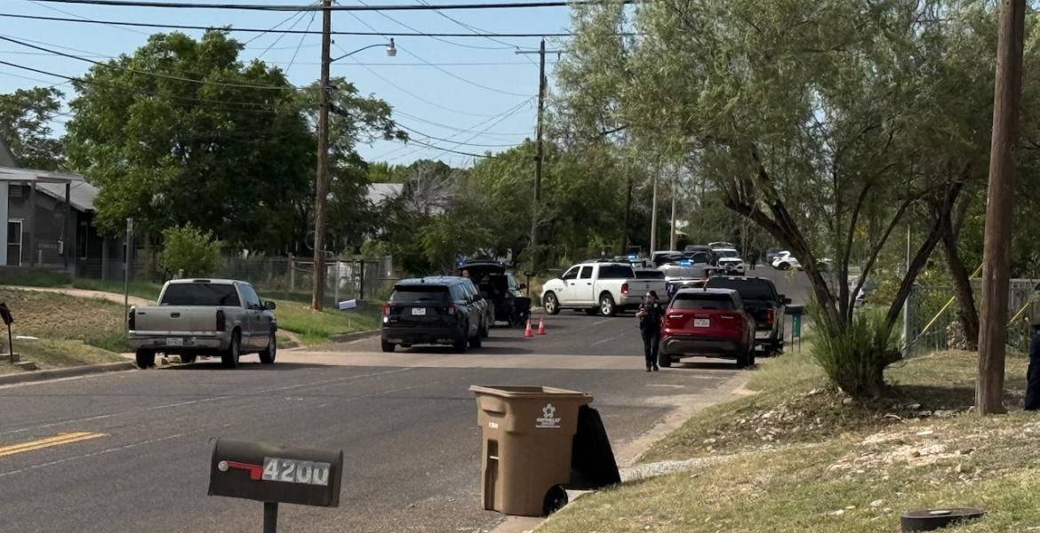 SWAT surrounds a house where barricaded subject is located on June 25, 2026