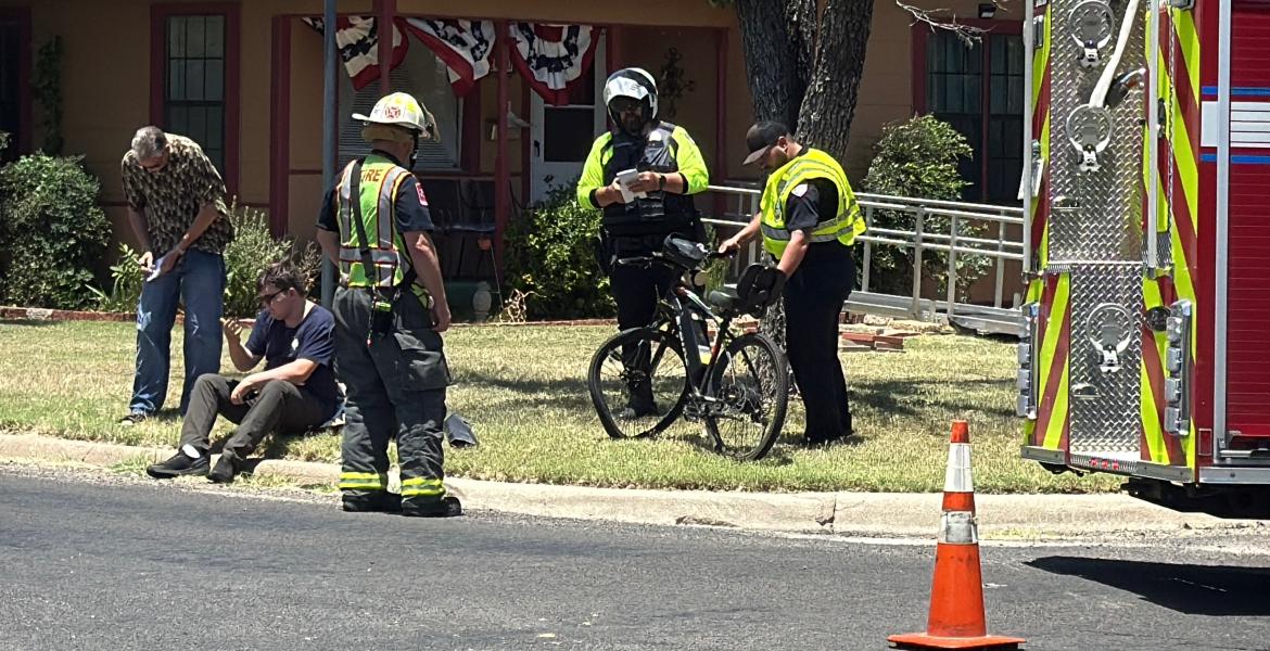 A man crashed his bicycle into a moving vehicle Monday afternoon after running a stop sign.