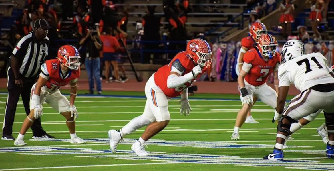 San Angelo Central's Riley Oines rushes the passer in a 2025 game against Midland Lee.
