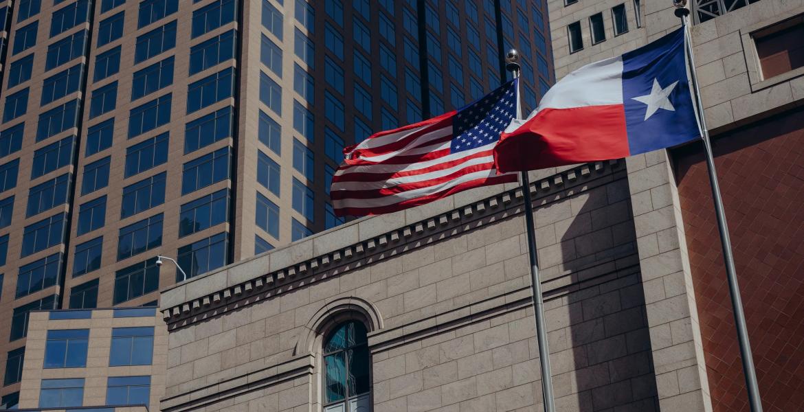 The American and Texas flags over Comerica Bank in downtown Dallas on Feb. 17, 2026.