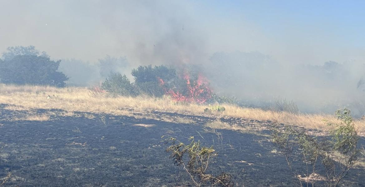 A wildfire south of Sonora has already burned approximately 1,200 acres and only remains about 25% contained, according to Sutton County Emergency Management.