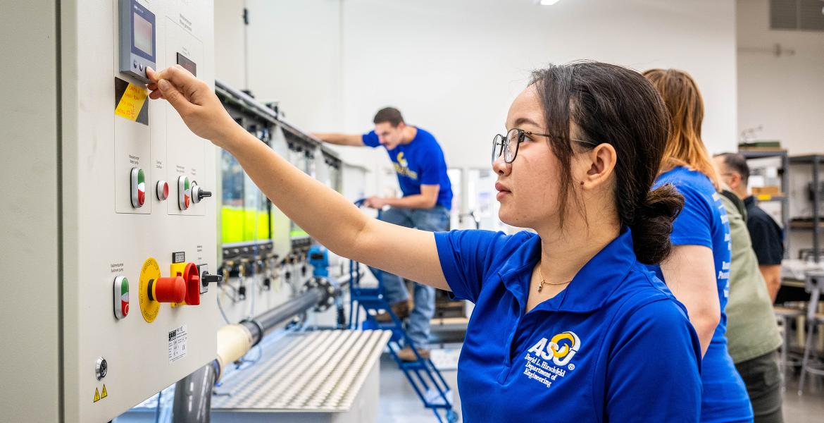 ASU engineering students working with the hydraulic water flume in the Hunter Strain Engineering Labs