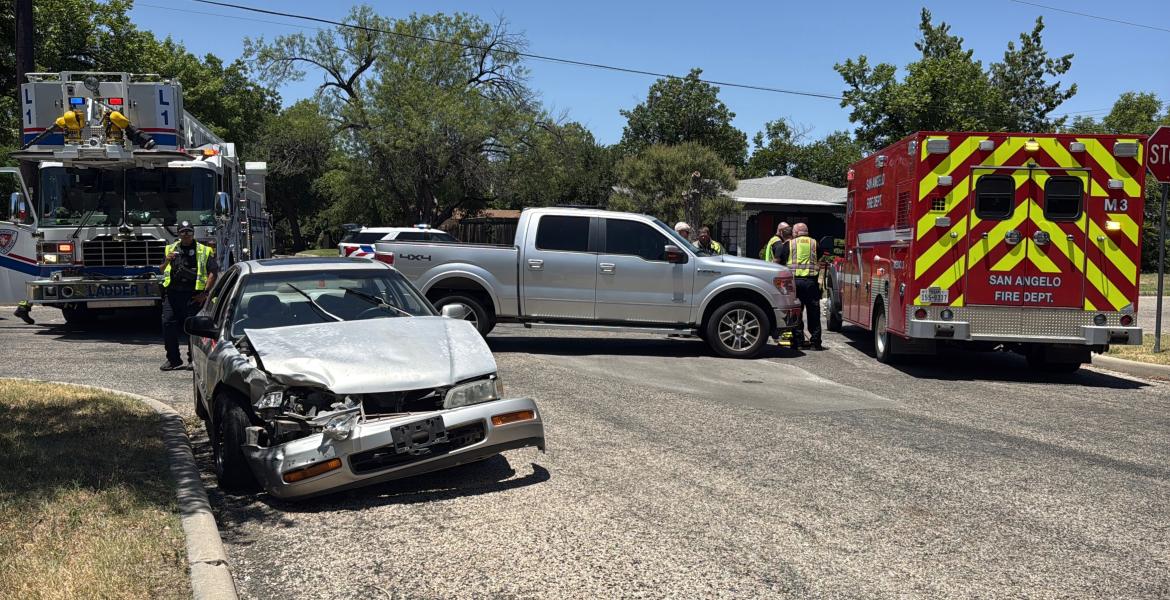 A woman was taken to the hospital Friday afternoon after a two-vehicle collision in a residential area.