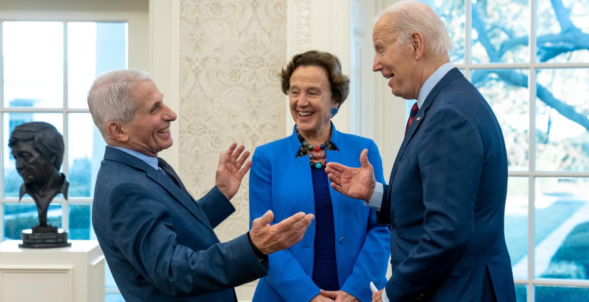 Dr. Anthony Fauci shares a laugh with President Joe Biden.