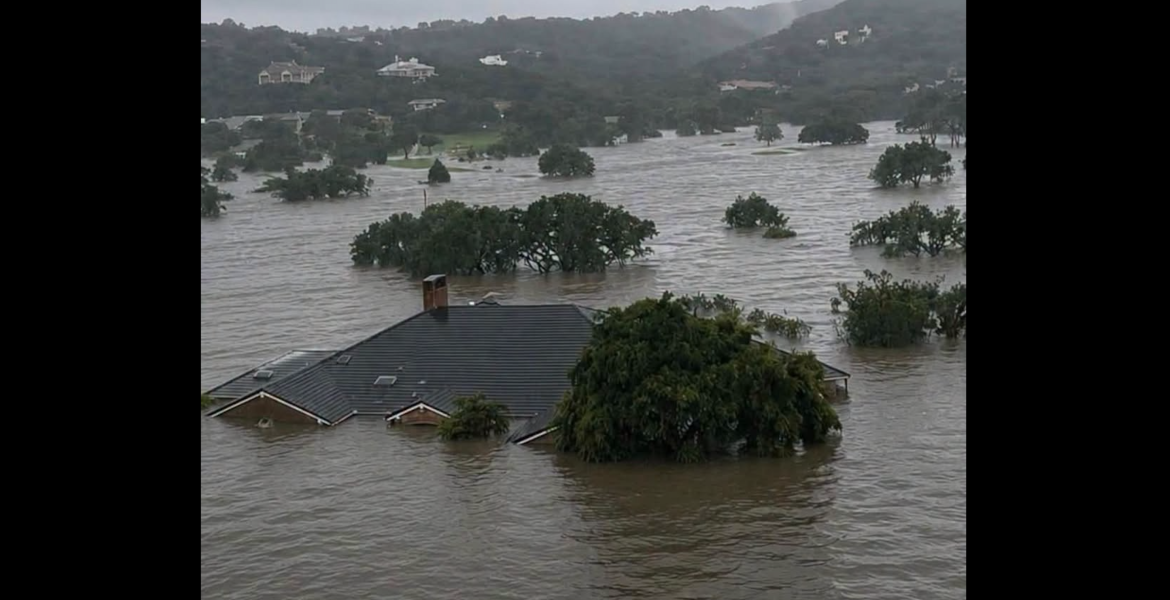 A house in shown under water after flooding near Boerne on July 16, 2026.