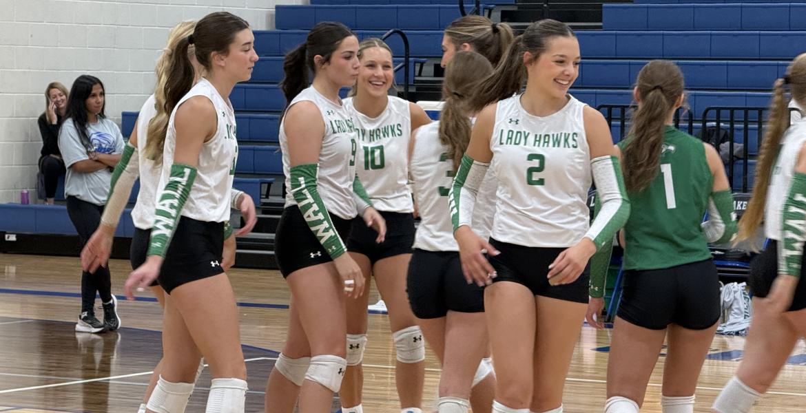 Wall's volleyball team laughs during the 2026 Nita Vannoy Memorial Tournament.