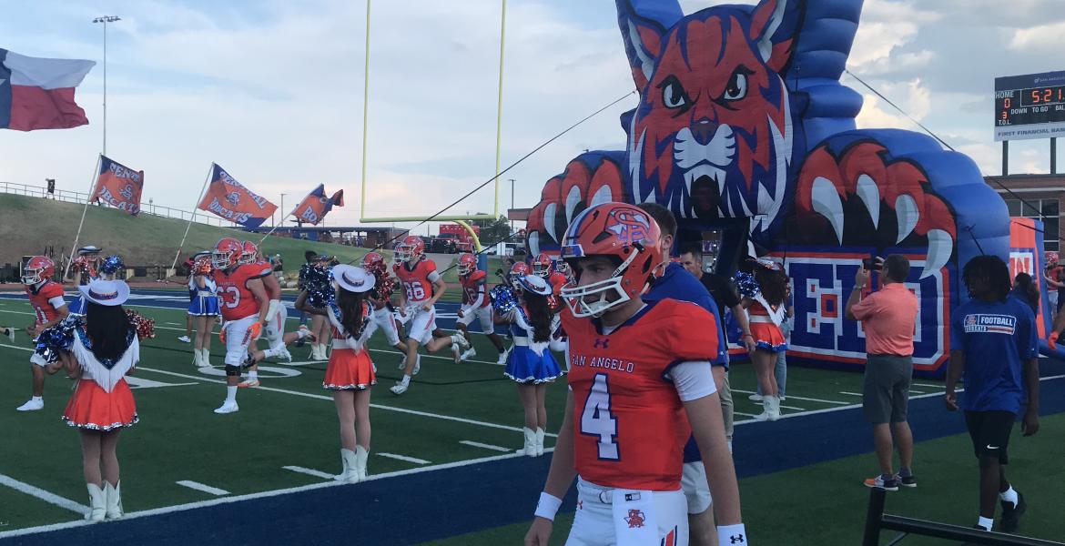The Central Bobcats run out of the tunnel before their 2026 season opener against Abilene High.