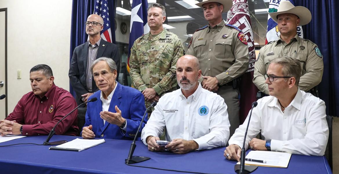 Gov. Greg Abbott speaks at a press conference Monday afternoon at the Texas Department of Emergency Management headquarters in Austin about a tropical depression that later strengthened into Tropical Storm Edouard. It is expected to move into southeast Texas on Tuesday.